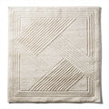 Textured cream area rug with geometric pattern 120 x 120 x 1cm for indoor use